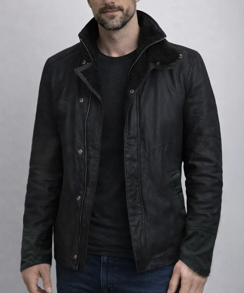 Male model styling black 2049 jacket with high collar