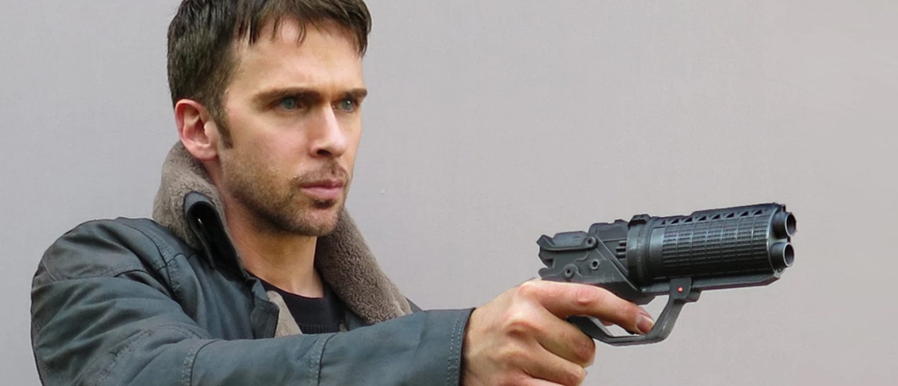 Man Holding a Gun
