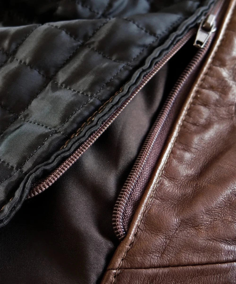 a close-up shot of a brown leather jacket