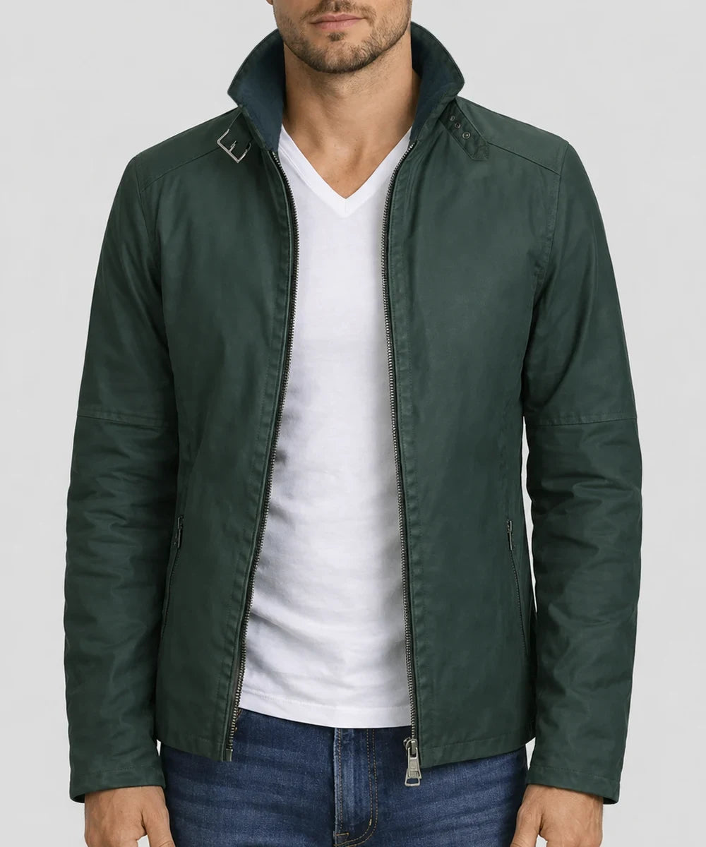 Model wearing men's green cotton jacket with slim fit vintage styling, buckle collar, and subtle design