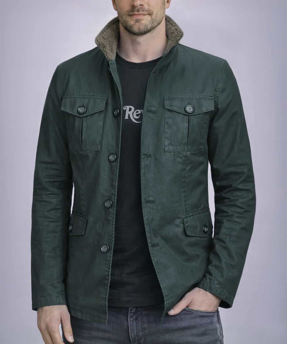 Model wearing green safari field jacket with shearling collar and button front